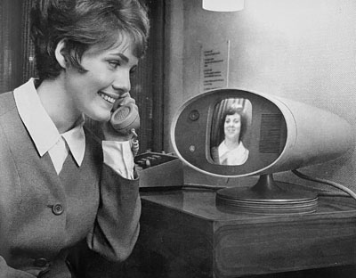 A woman using the AT&T PicturePhone